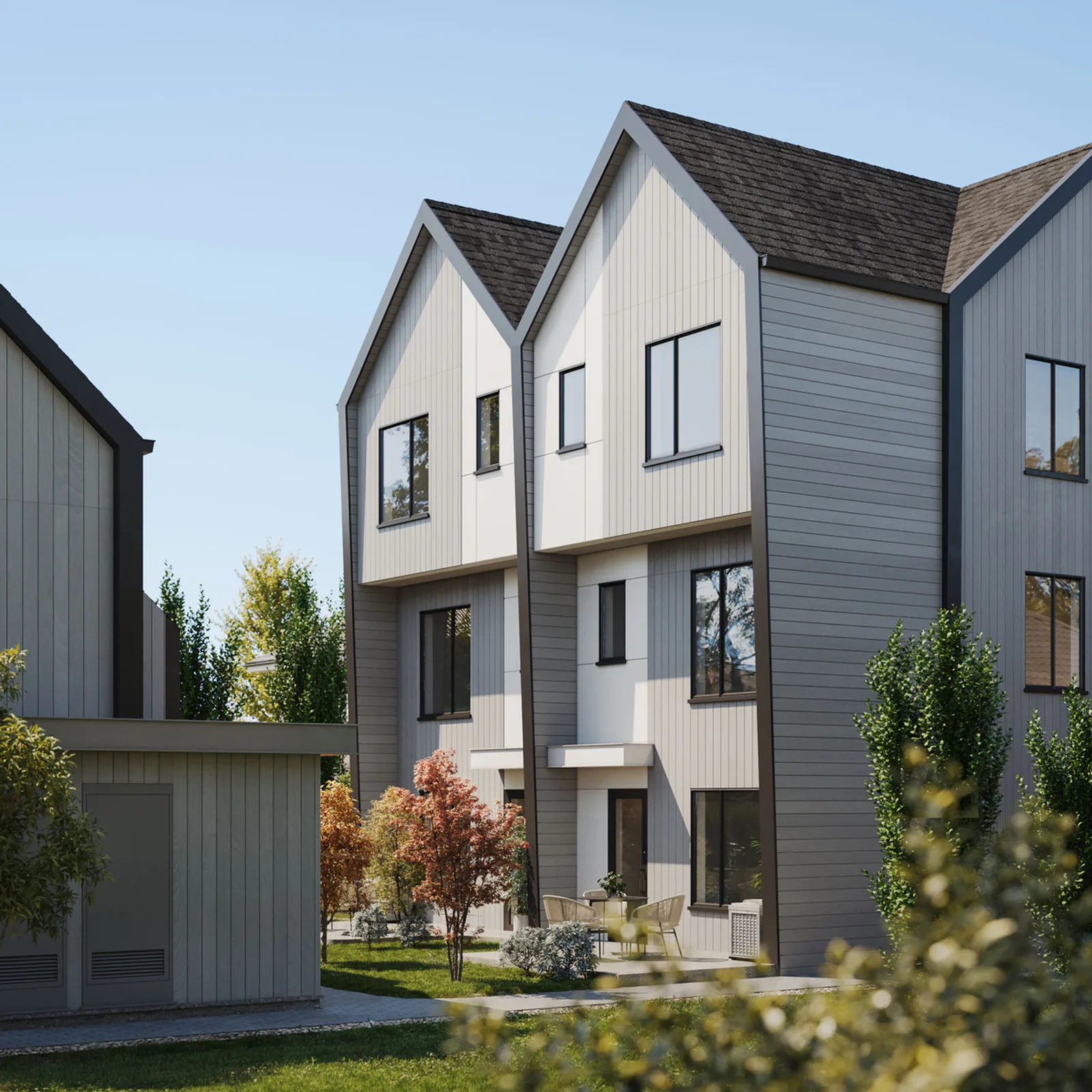 Rendering of a three-storey multiplex with gabled roofs, grey siding and a shared garden