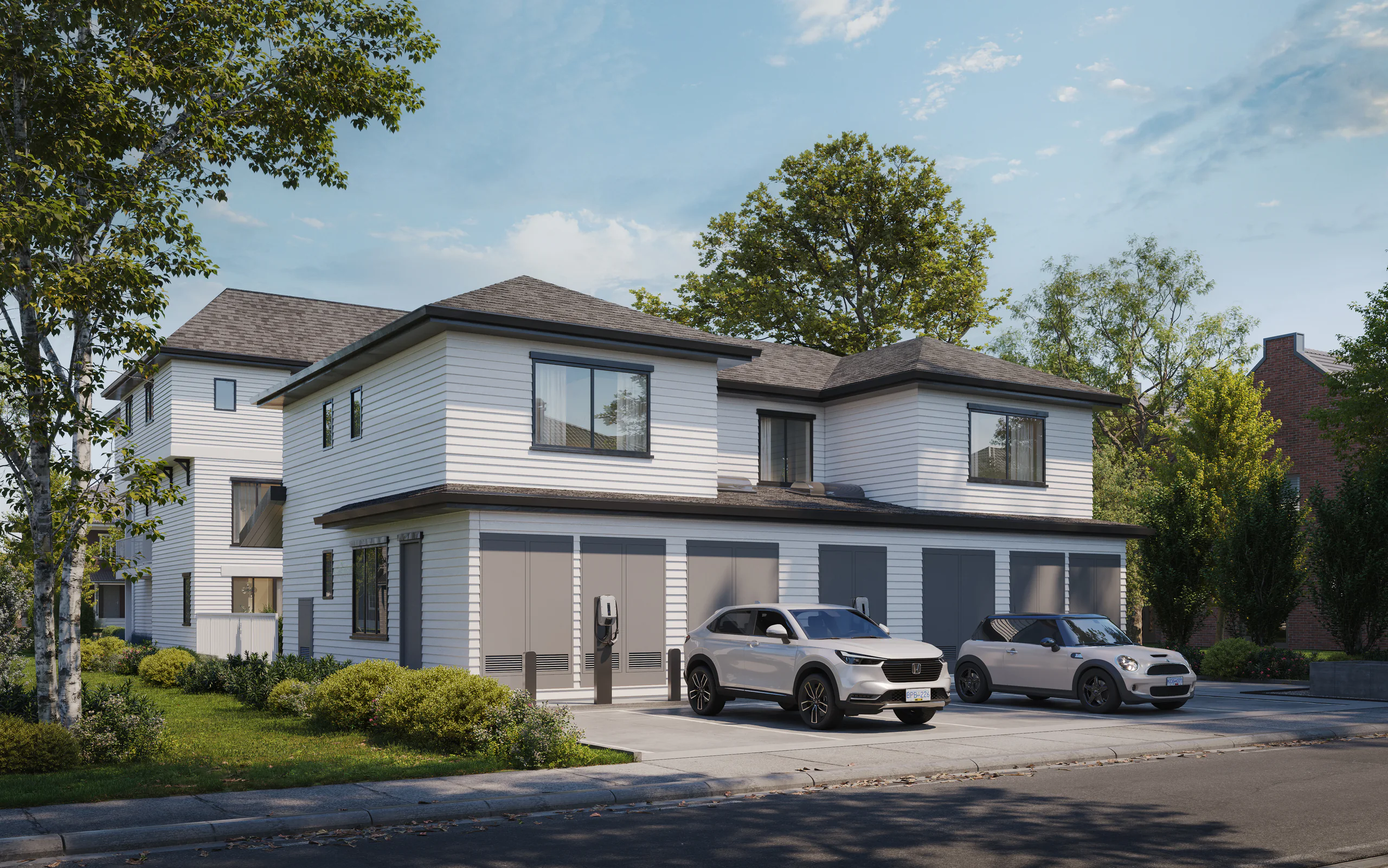 A two-storey house with a car parked in the driveway