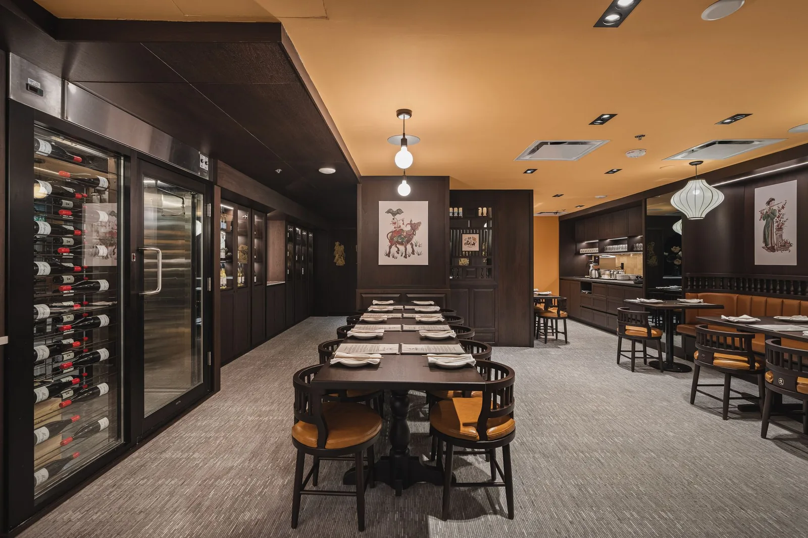 Long table beside a glass wine room, looking down the room, Linh Noodle Bar by Costar Construction, Vancouver